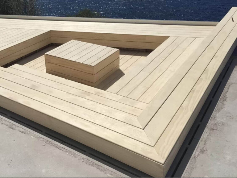 Accoya Decking, natural finish, featured in an outdoor seating area.